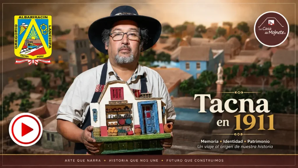 Sergio Loaiza presenta maqueta de casa tradicional de Tacna en 1911 elaborada con técnica de arena encolada, frente a diorama urbano.