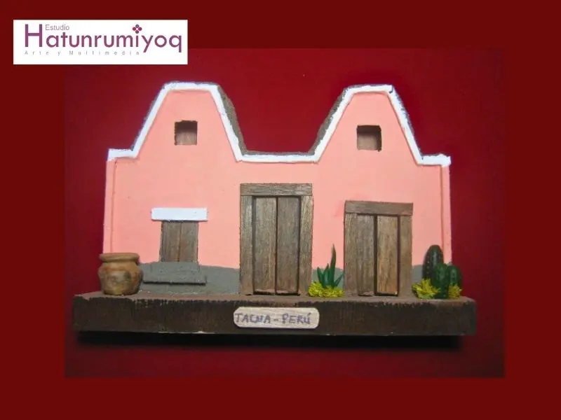 La Casa del Mojinete| Evolución de nuestra artesanía Maqueta artesanal de una vivienda tradicional de Tacna con doble techo de mojinete, elaborada en arena encolada durante la segunda generación de artesanía arquitectónica desarrollada en 2011.